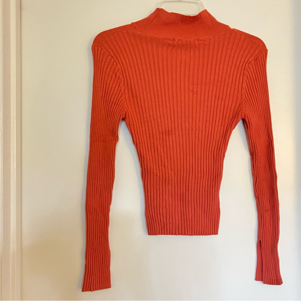 Orange turtle neck long sleeve with split sleeve